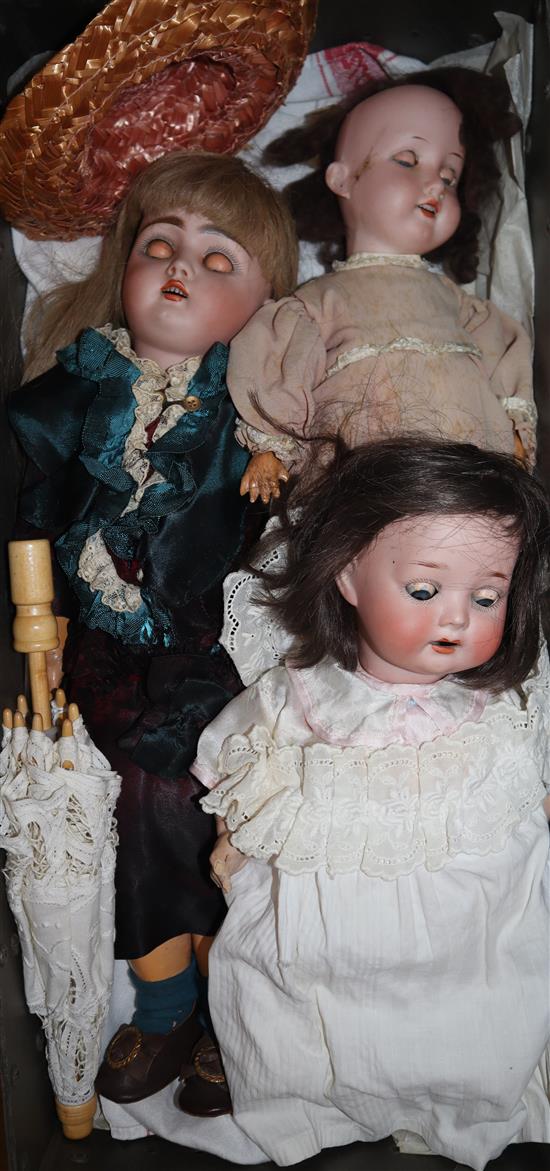 A Heubach 444 open mouth, pierced ears, jointed bisque headed doll in original costume and an Armand Marseille 390 doll